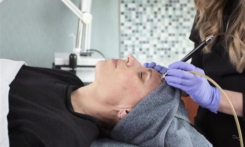 woman receiving Diamond Luminous Facial